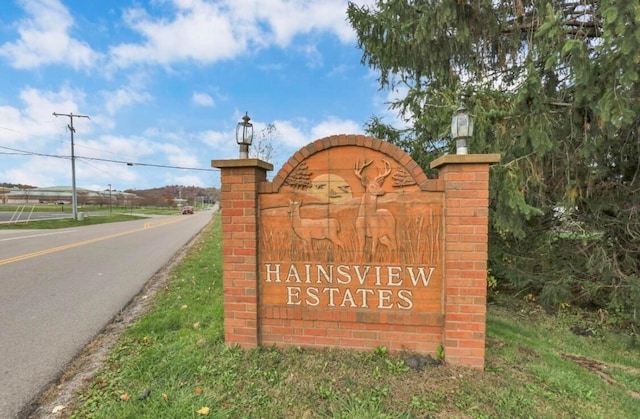 view of community sign