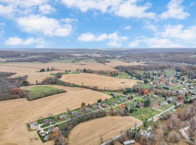 birds eye view of property featuring a rural view