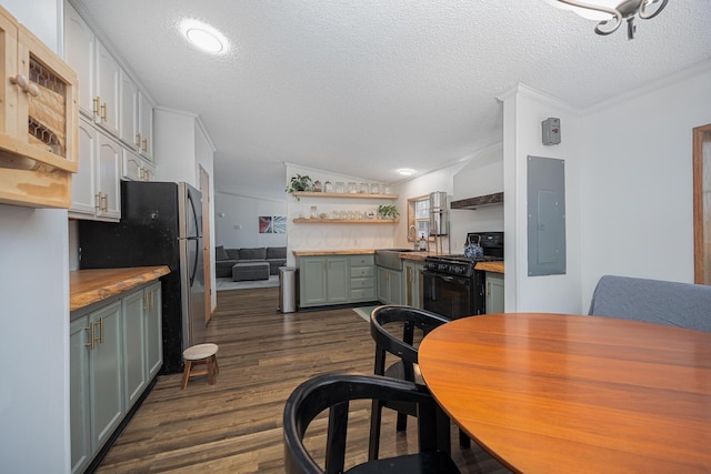 kitchen with electric panel, dark hardwood / wood-style flooring, black range, and a textured ceiling