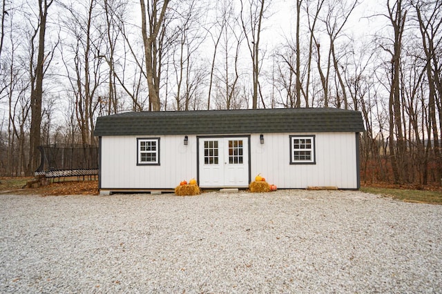 view of outbuilding featuring a trampoline