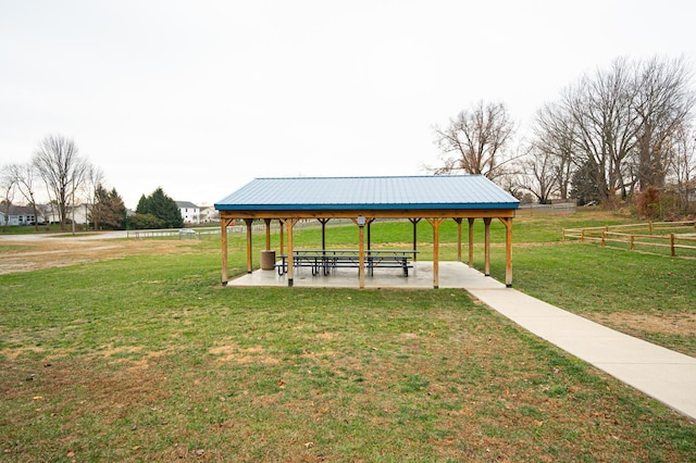 surrounding community featuring a gazebo and a yard