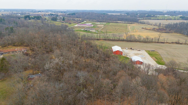 birds eye view of property with a rural view