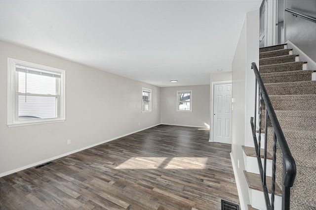 interior space with dark wood-type flooring