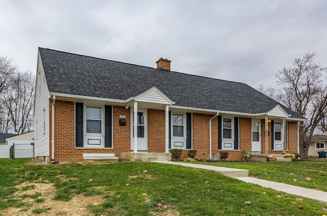 view of front of property with a front lawn