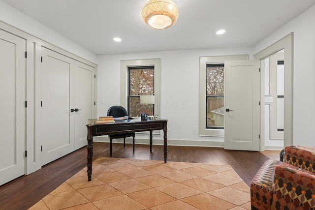 office area with hardwood / wood-style floors