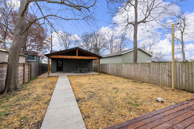 back of property featuring a patio area