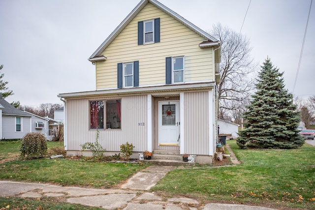 view of front property featuring a front yard