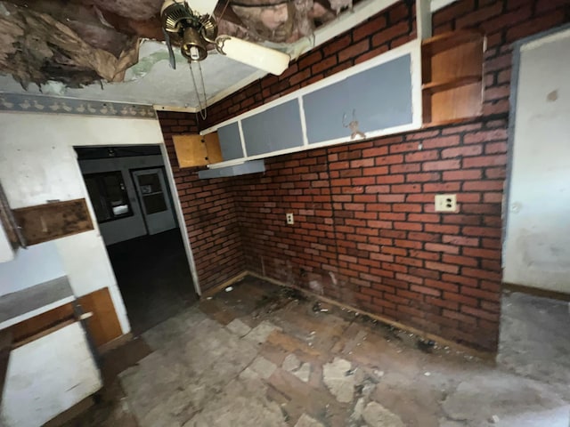 kitchen with brick wall