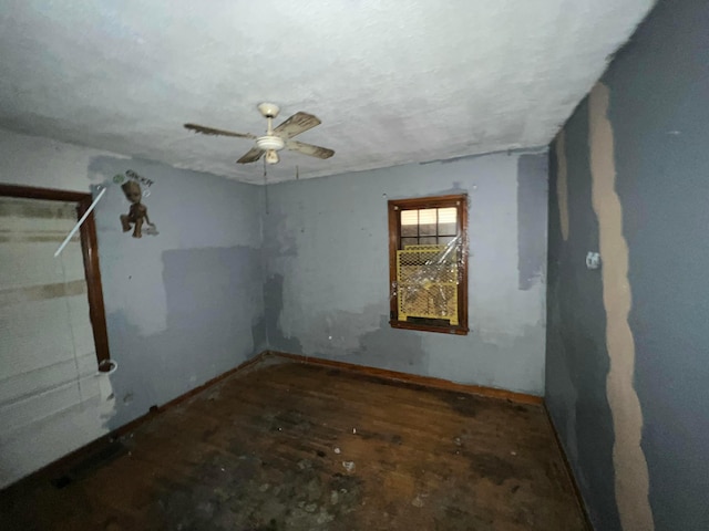 spare room with ceiling fan