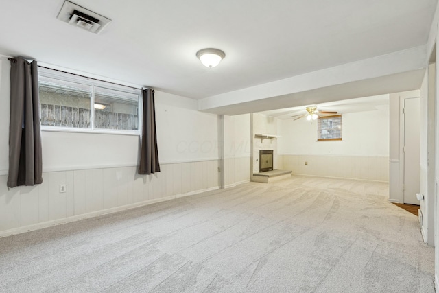 interior space featuring ceiling fan