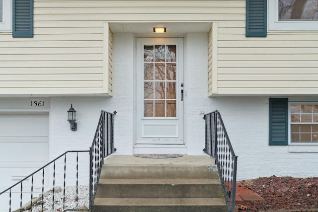 property entrance featuring a garage