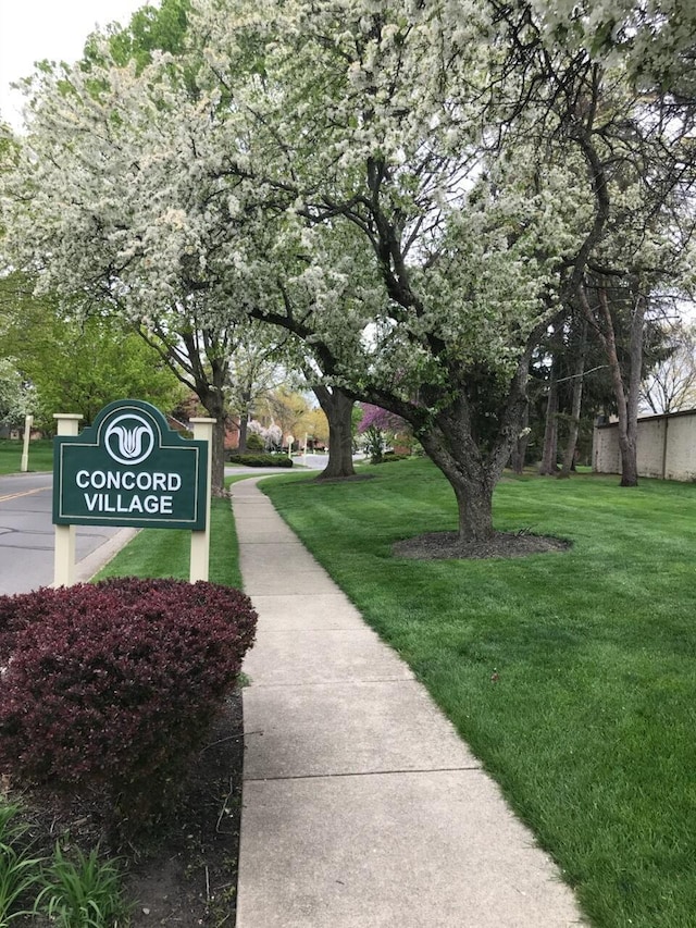 view of community featuring a lawn