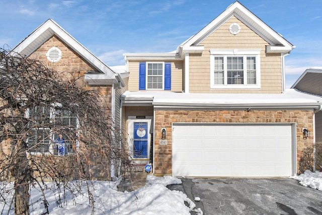 front of property with a garage