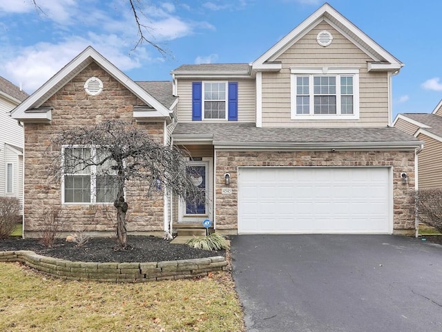 front of property featuring a garage