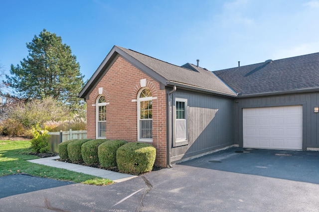 view of home's exterior featuring a garage