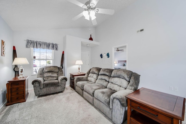 living room with high vaulted ceiling, a textured ceiling, and ceiling fan