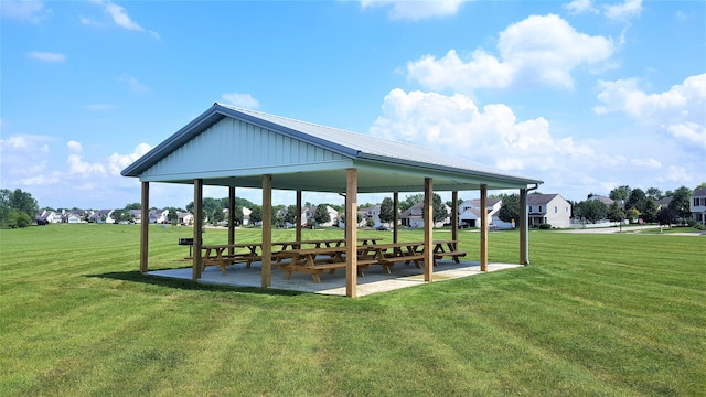 surrounding community with a gazebo, a yard, and a patio area