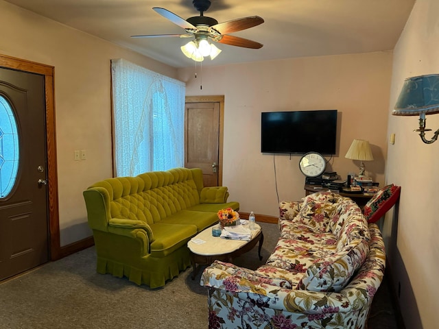 carpeted living room featuring ceiling fan