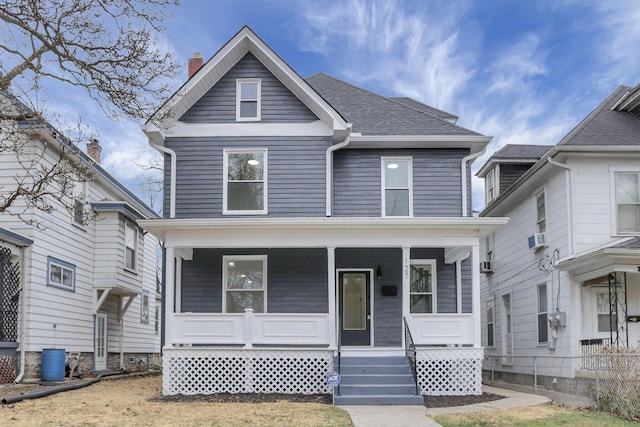 view of property with covered porch