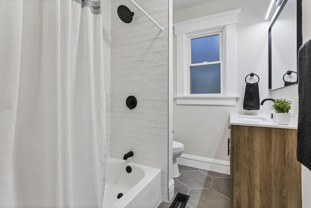 full bathroom with tile patterned flooring, vanity, shower / bath combo, and toilet