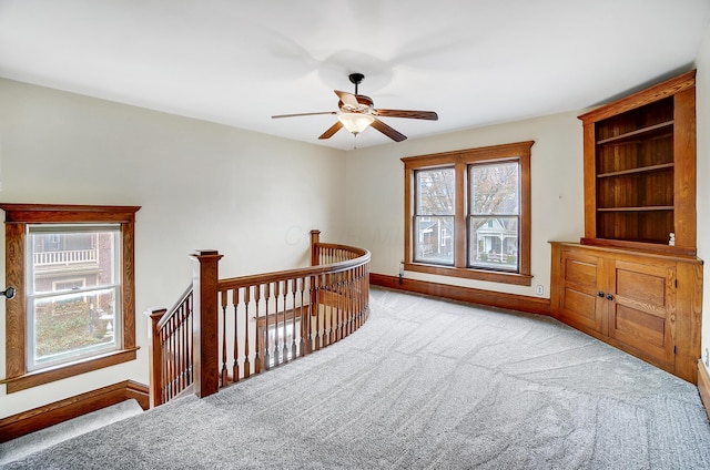 interior space featuring light carpet