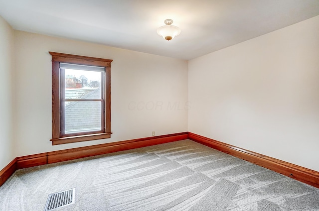 view of carpeted spare room