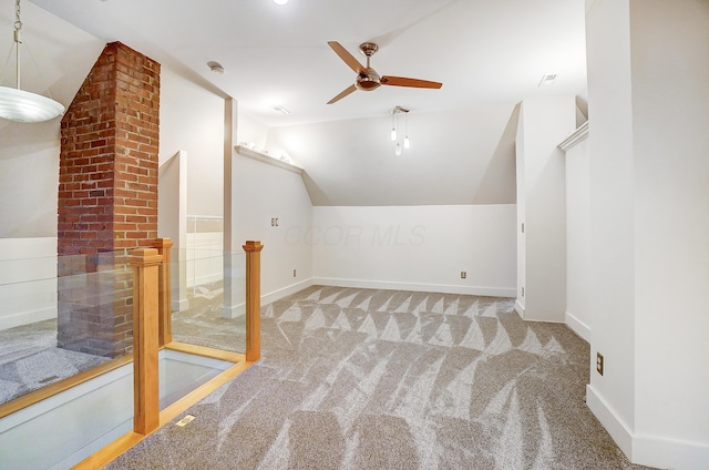 bonus room featuring ceiling fan, light colored carpet, and lofted ceiling