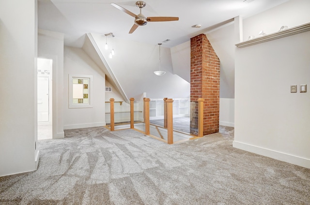 bonus room featuring carpet flooring, vaulted ceiling, and ceiling fan