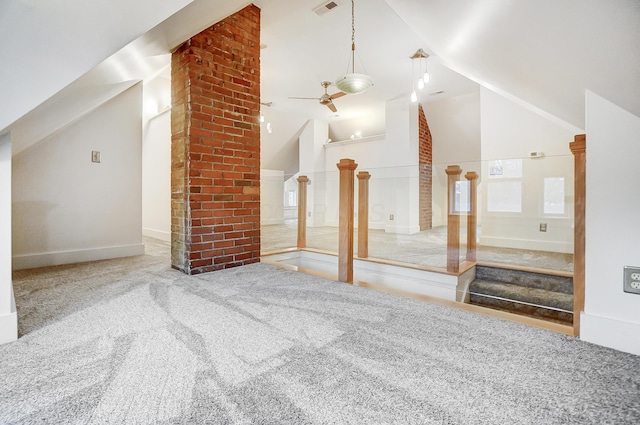 additional living space with light carpet, high vaulted ceiling, and ceiling fan