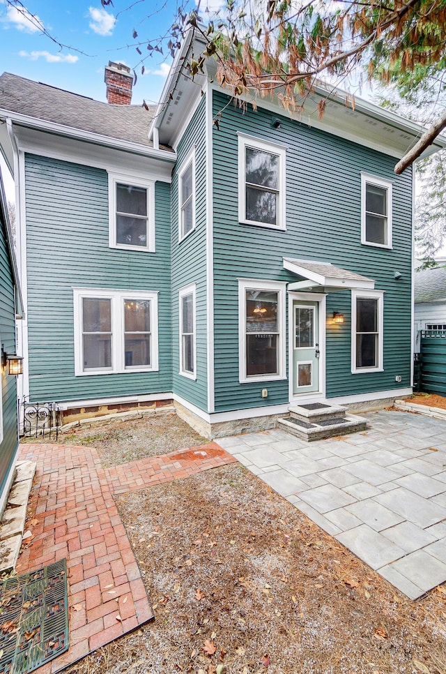 back of house featuring a patio