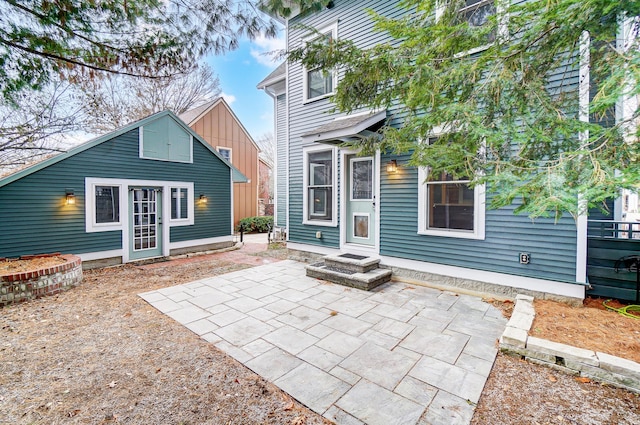 back of house featuring a patio area