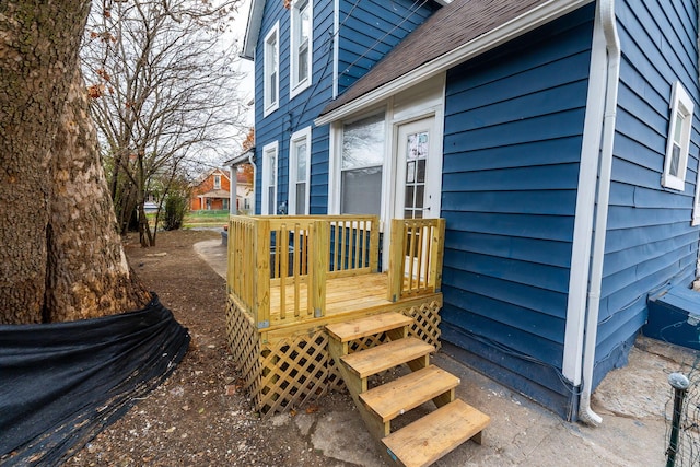 view of home's exterior featuring a deck