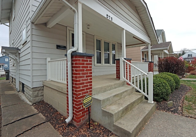 entrance to property with covered porch