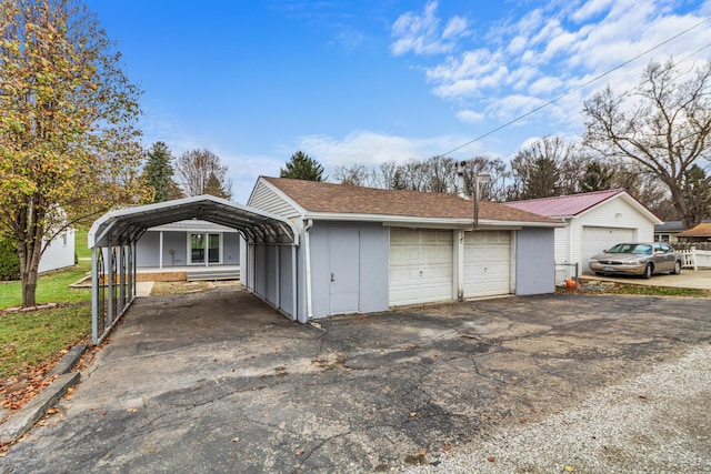 garage with a carport