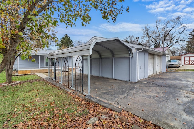 garage with a carport