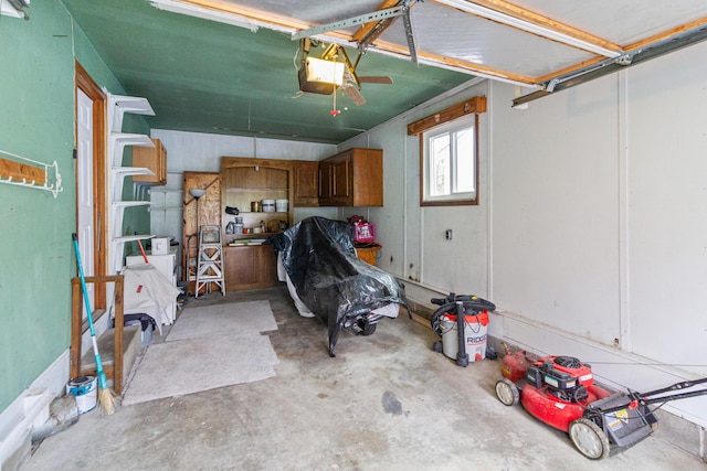 garage featuring a garage door opener