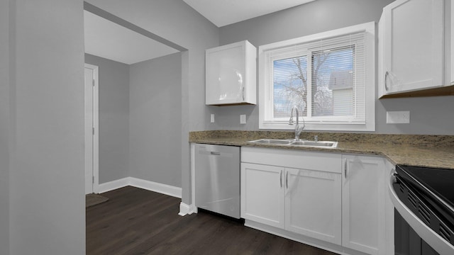 kitchen featuring light stone countertops, sink, stainless steel appliances, dark hardwood / wood-style floors, and white cabinets