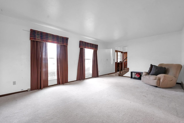 unfurnished room featuring carpet flooring