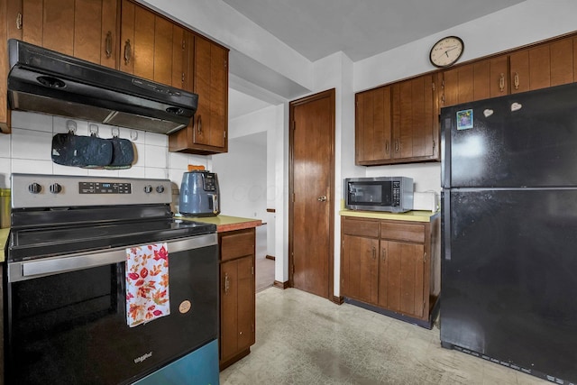 kitchen featuring backsplash and appliances with stainless steel finishes