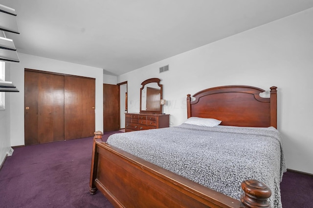 carpeted bedroom featuring a closet