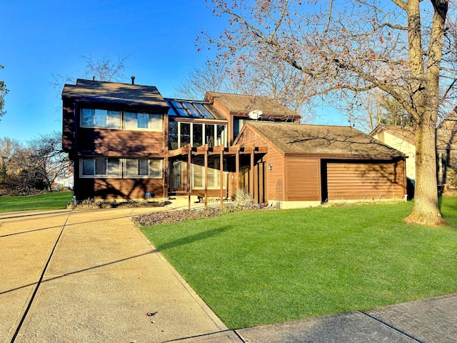 rear view of house with a yard