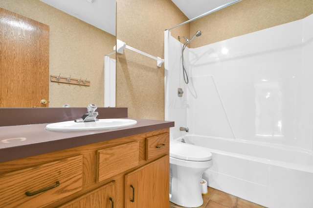 full bathroom with toilet, vanity, tile patterned floors, and shower / washtub combination