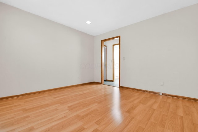 empty room with light wood-type flooring