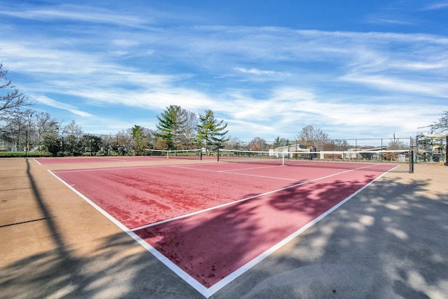 view of tennis court with basketball court