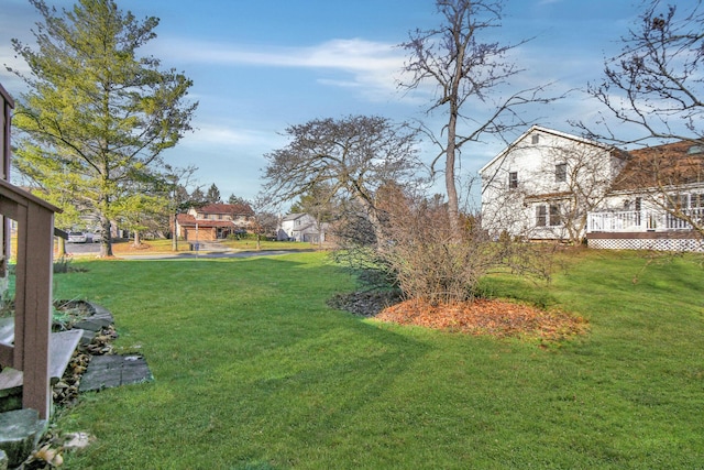 view of yard with a deck