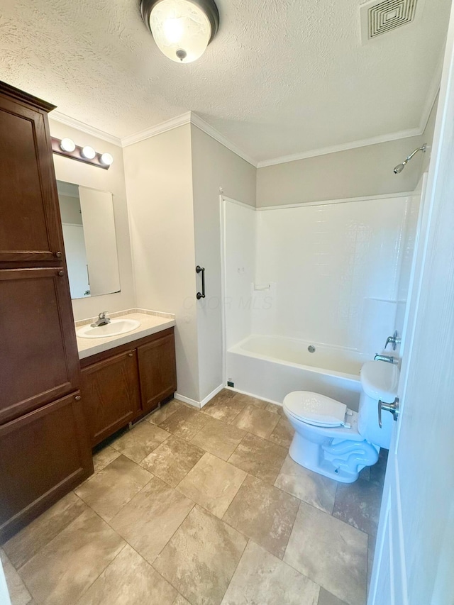 full bathroom featuring washtub / shower combination, a textured ceiling, toilet, vanity, and ornamental molding