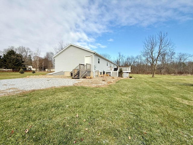 view of property exterior featuring a lawn