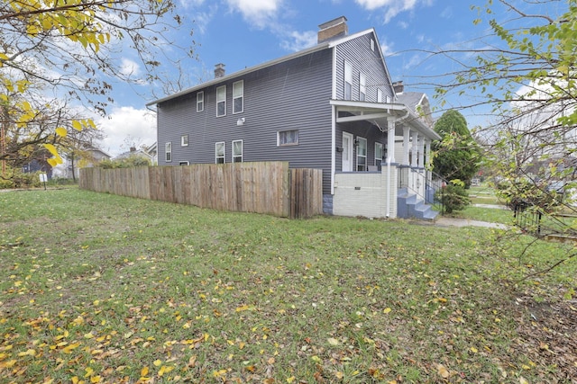 view of property exterior featuring a yard