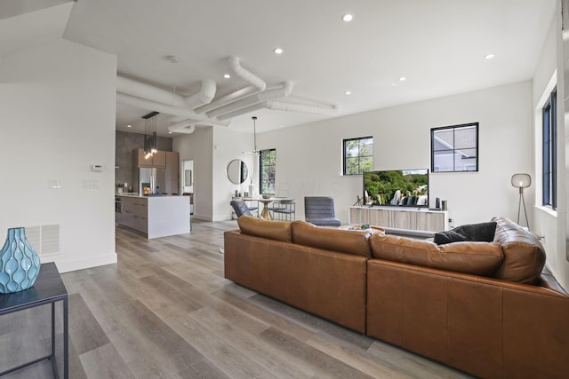 living room with light wood-type flooring