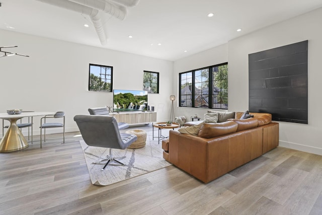 living room with light hardwood / wood-style floors